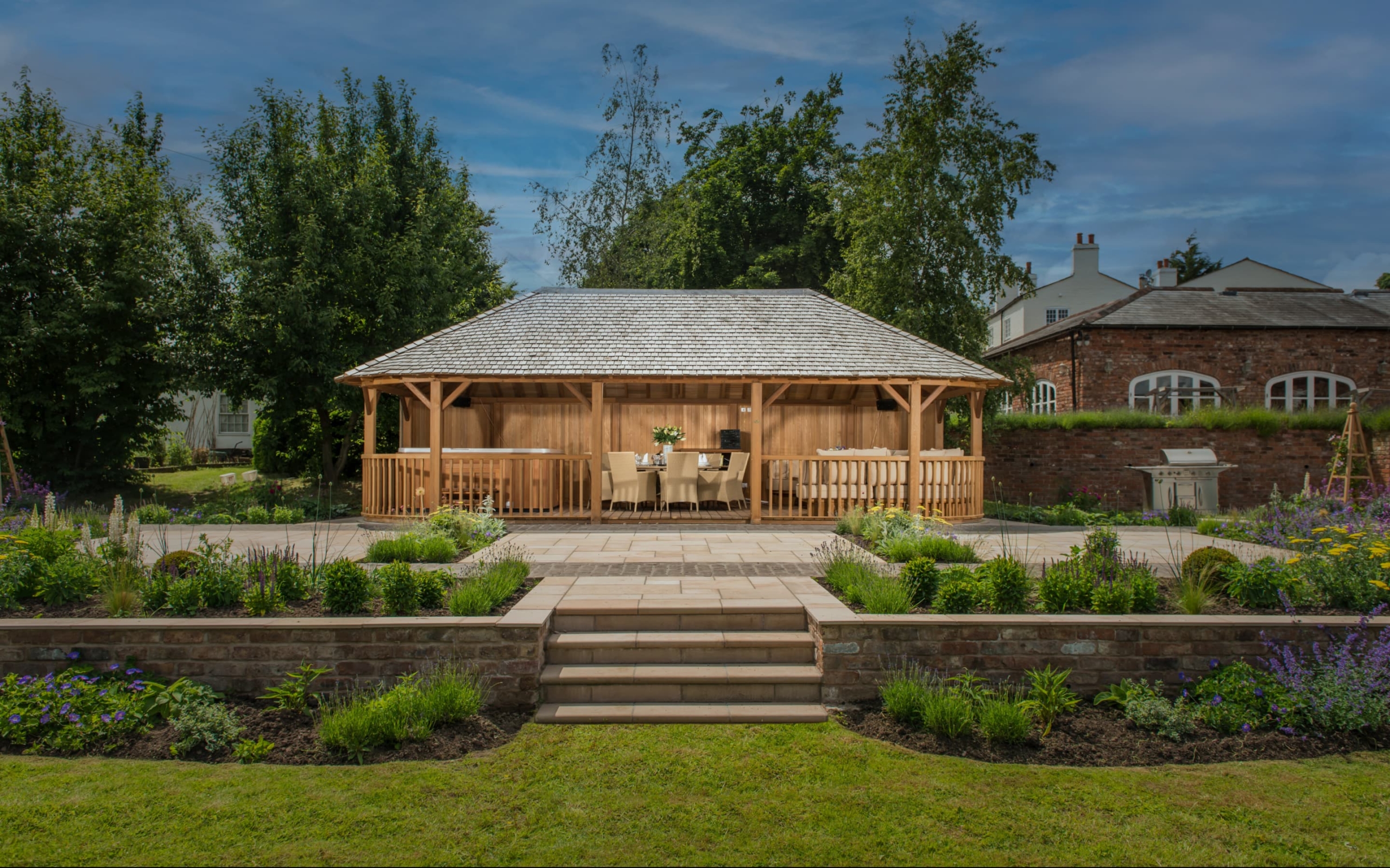 Crown Pavilions luxury summer house in garden setting
