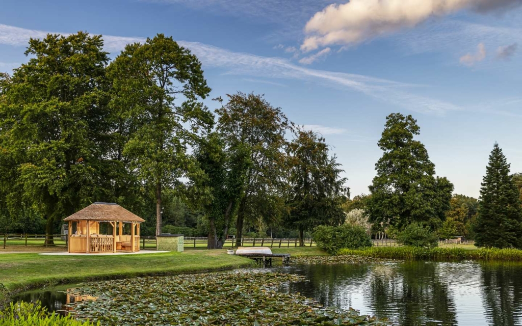 Garden room alongside a lake